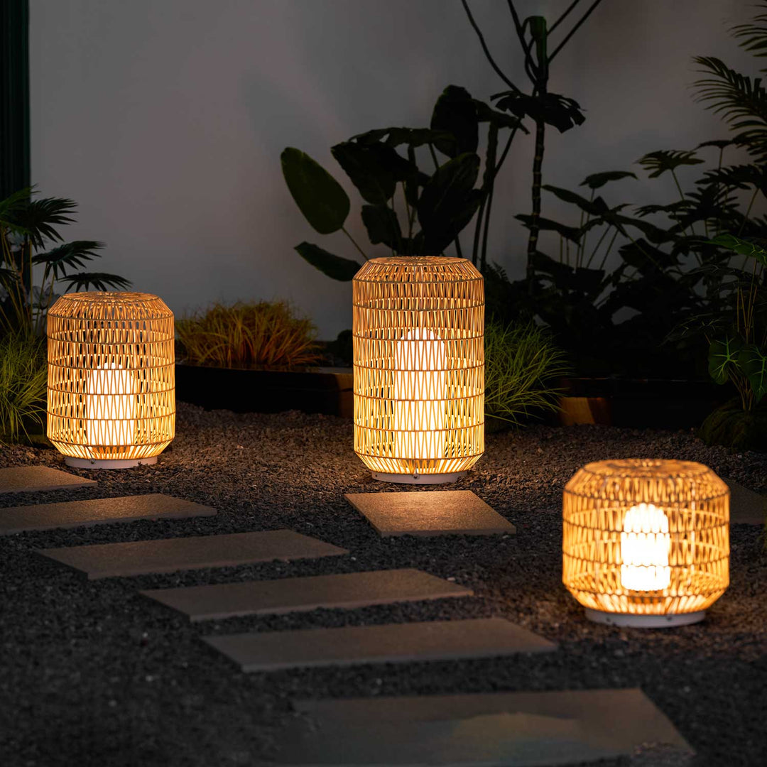 Close-up of the intricate rattan weave on the outdoor lamp shade.