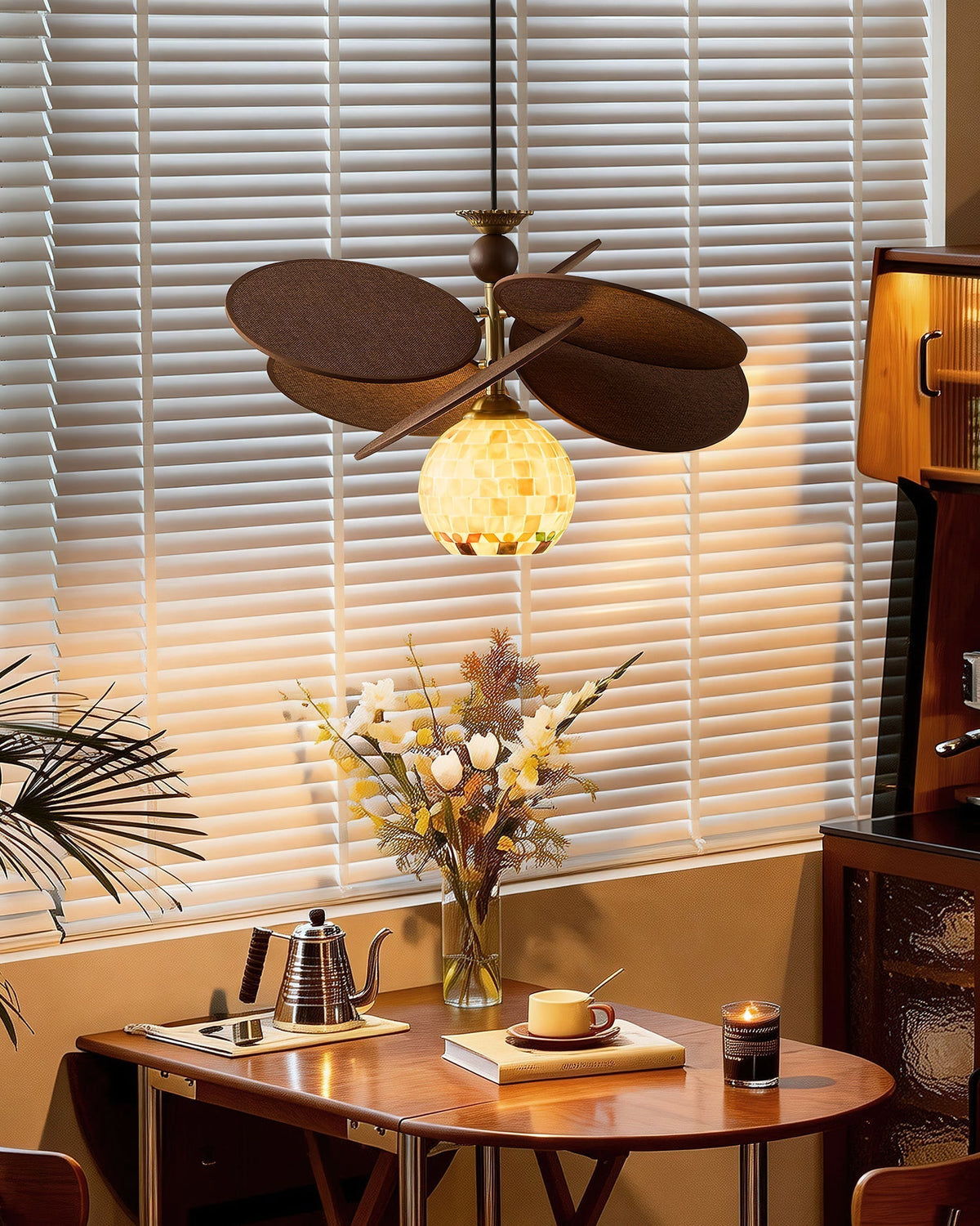The chandelier shown lit, casting a warm ambient glow.