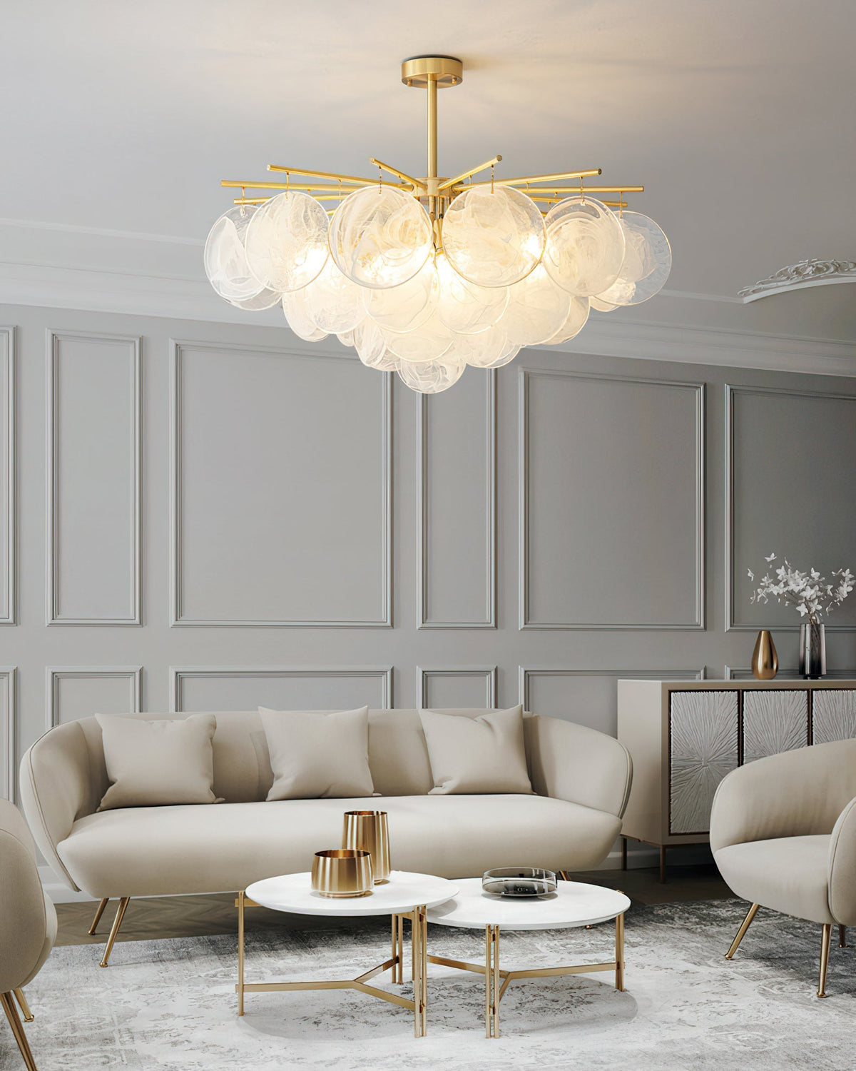 The Celestia Chandelier in gold finish, showing the brass starburst frame.