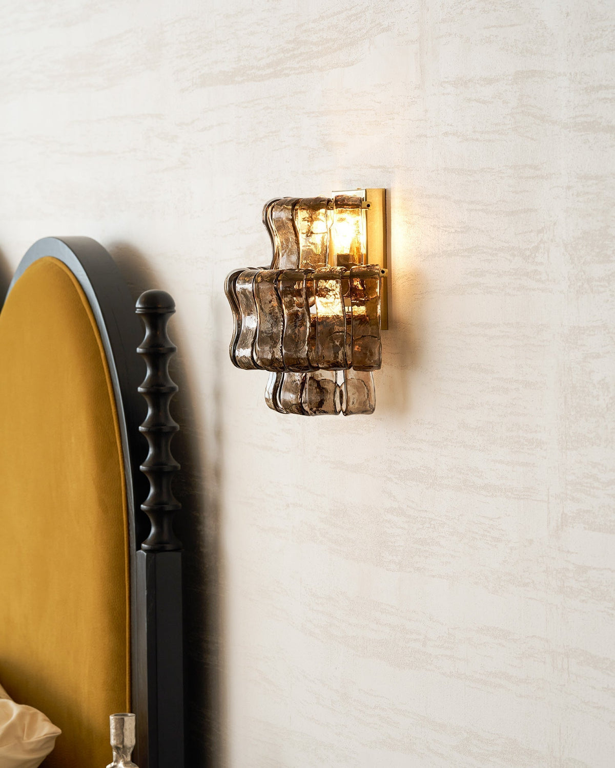 Albano Wall Lamp in smoke grey in a minimalist hallway.