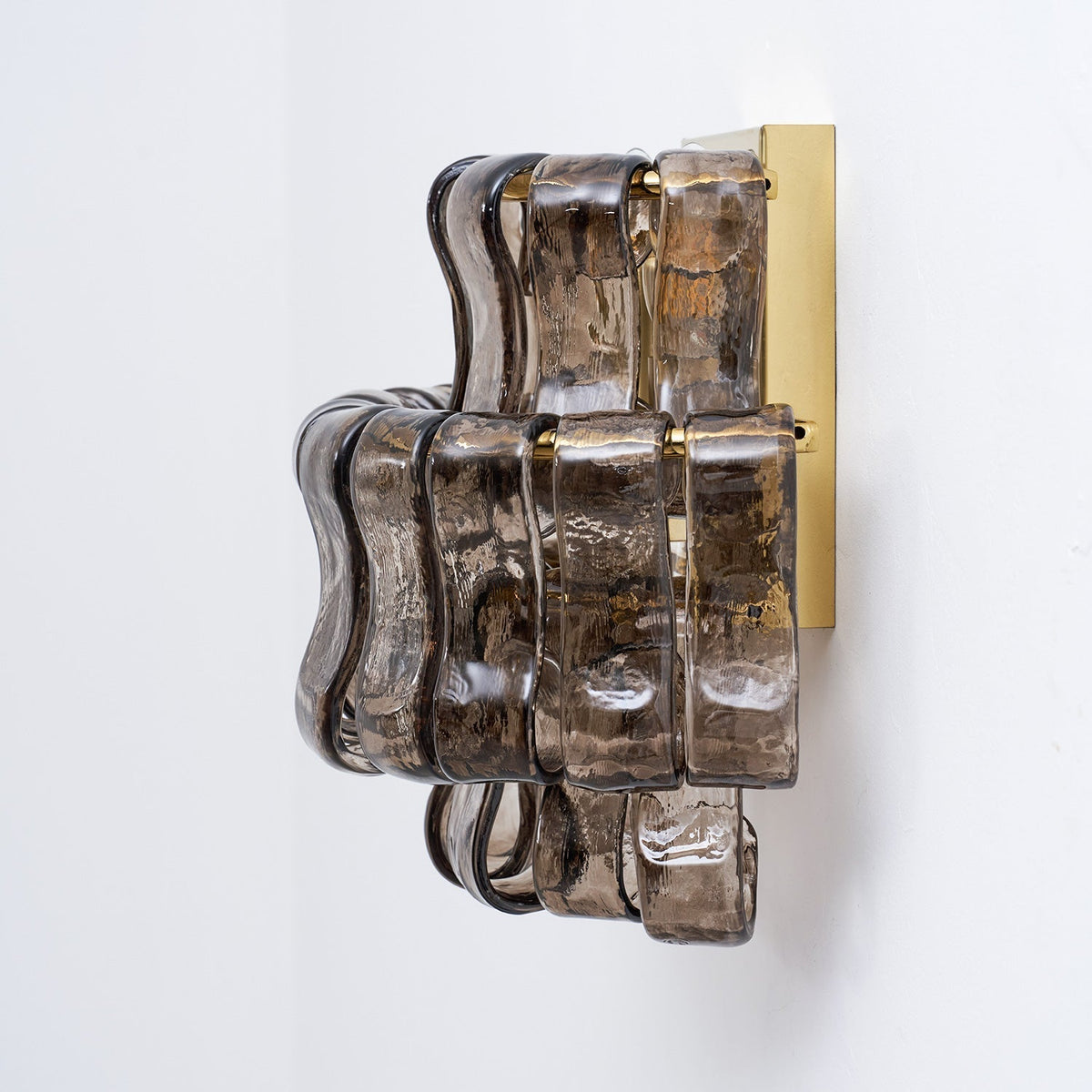Albano Wall Lamp in gold glass in a formal dining area.