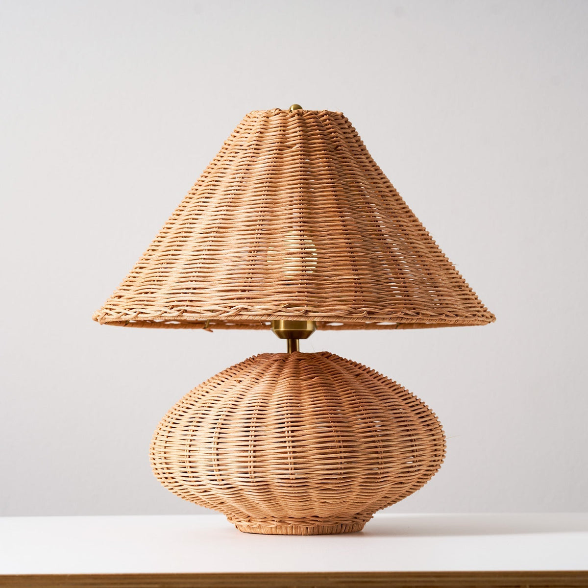 Bobine Table Lamp placed on a console table in an entryway.