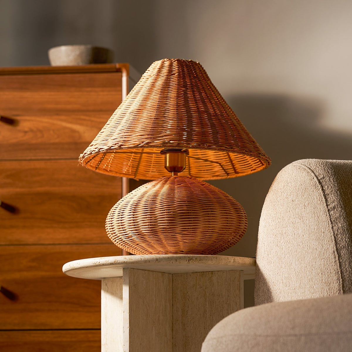 Bobine Table Lamp used as a bedside light on a nightstand.