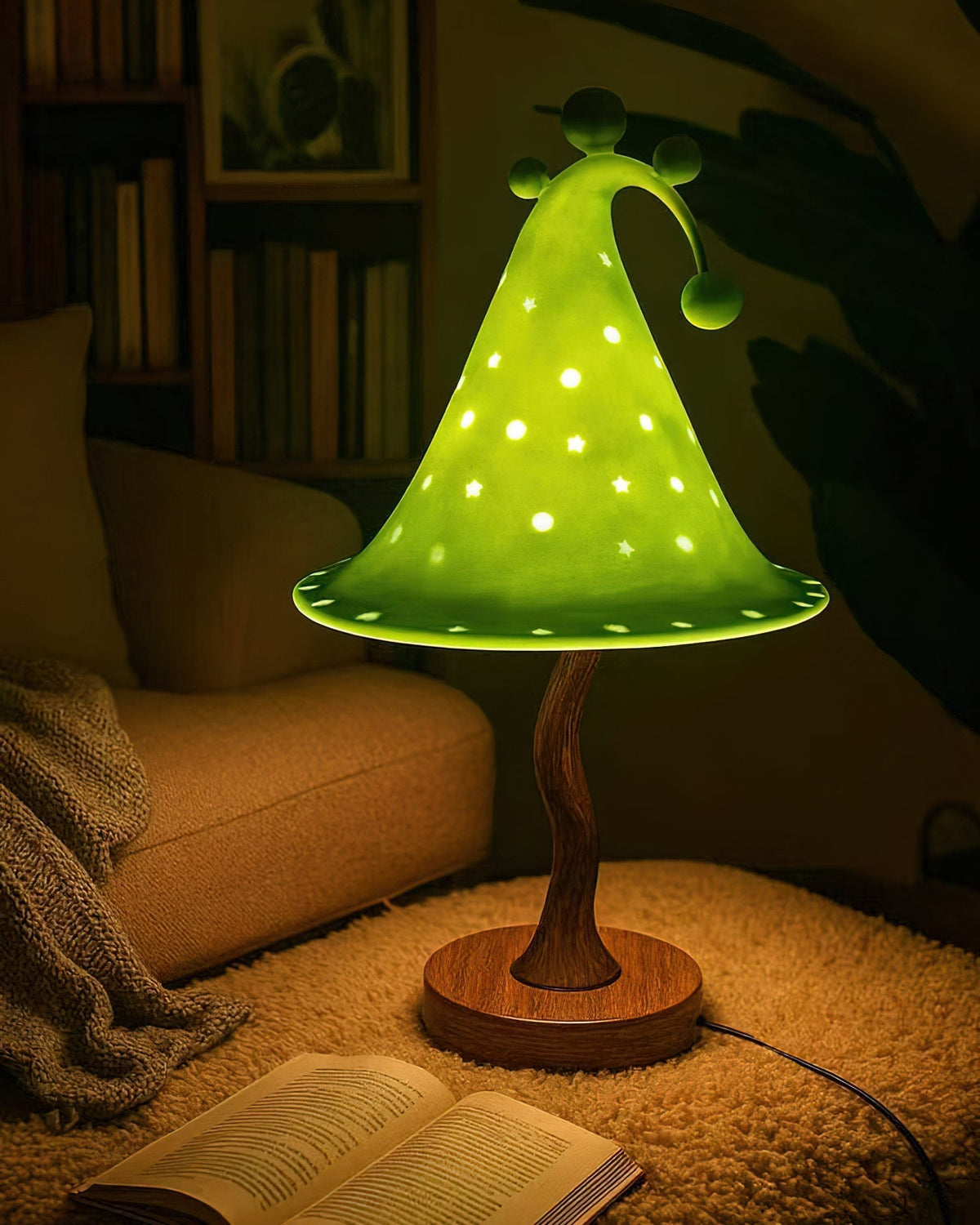 The Wizard Hat Table Lamp lit up, casting a warm glow on a wall.