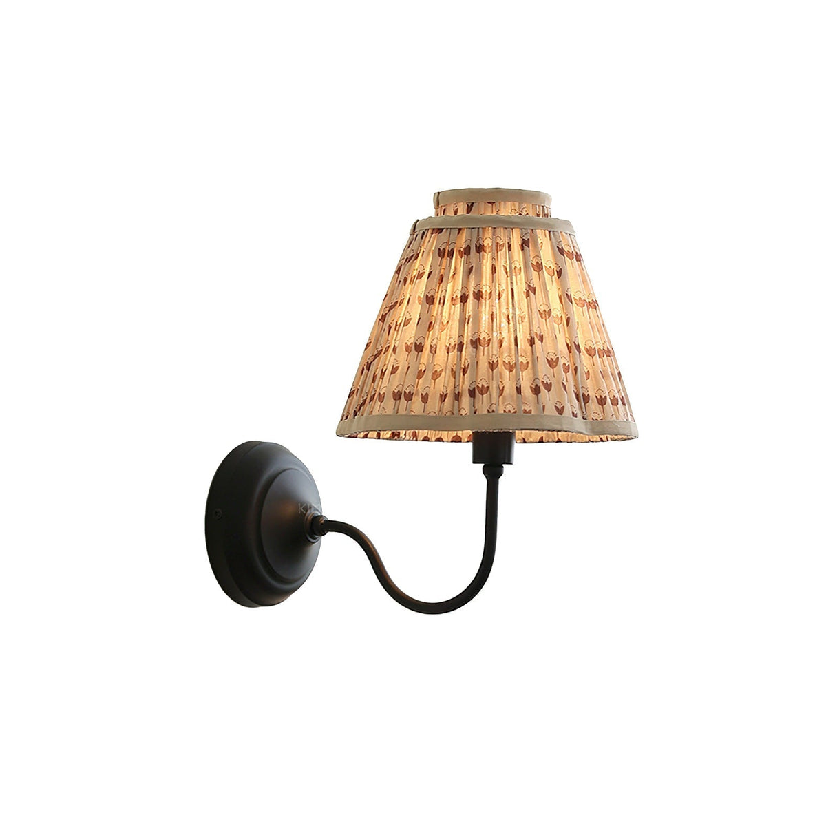 Elbow Wall Light with a light brown floral shade against a plain wall.