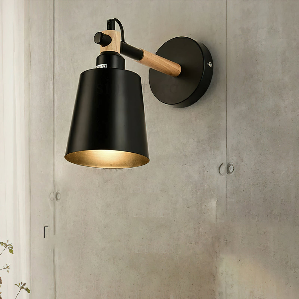 Close-up of the Copita Wall Lamp's wood and metal detail.