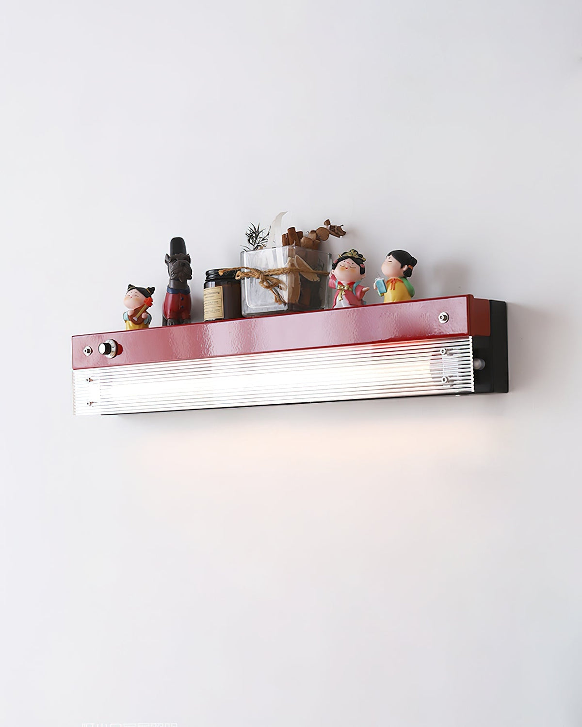 Comparison of the red, orange, and yellow Totem Wall Lamps.