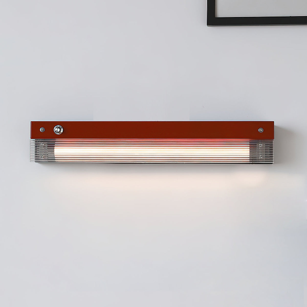 The orange Totem Wall Lamp in a child's playroom.